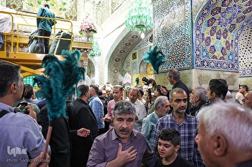 Ceremony Held to Replace Flag, Covering of Imam Reza Holy Shrine